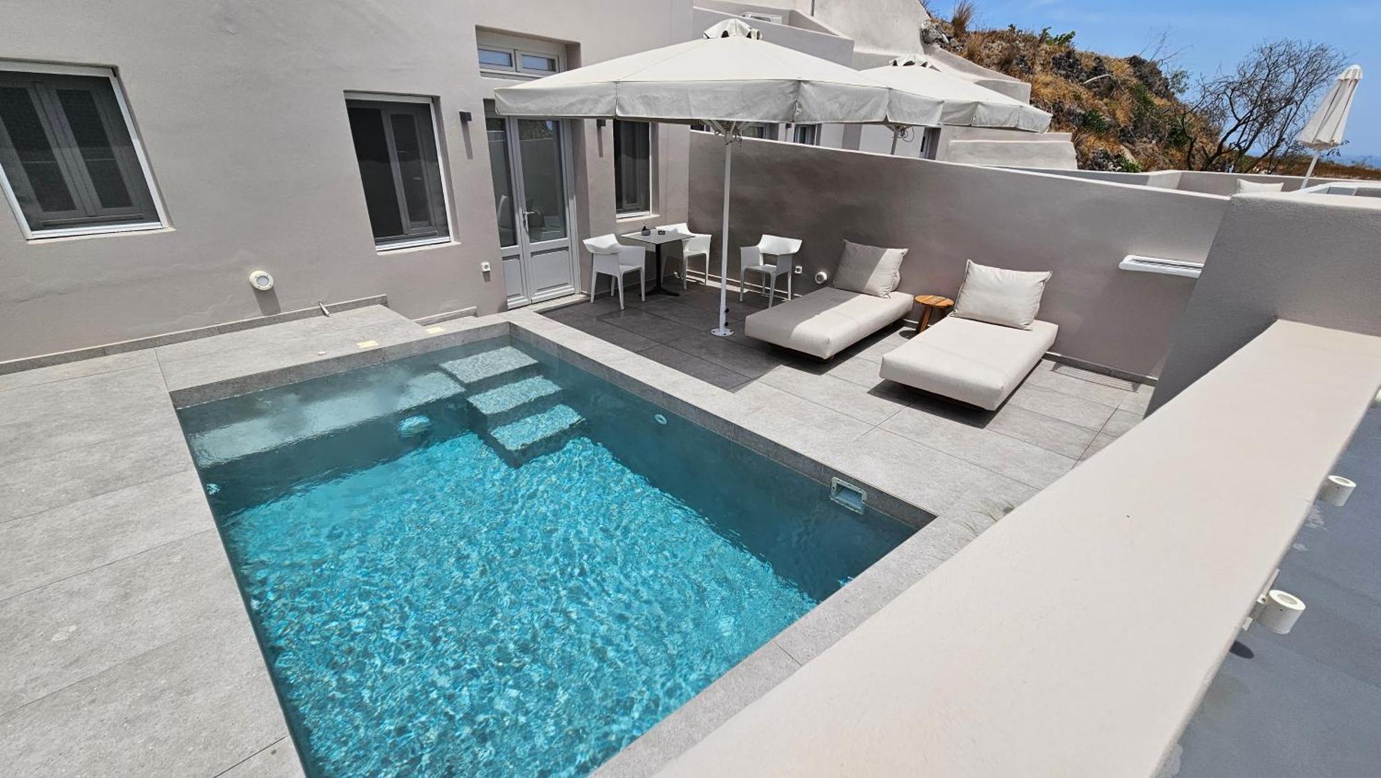 Petroma Cave Suites Vourvoulos Номер фото