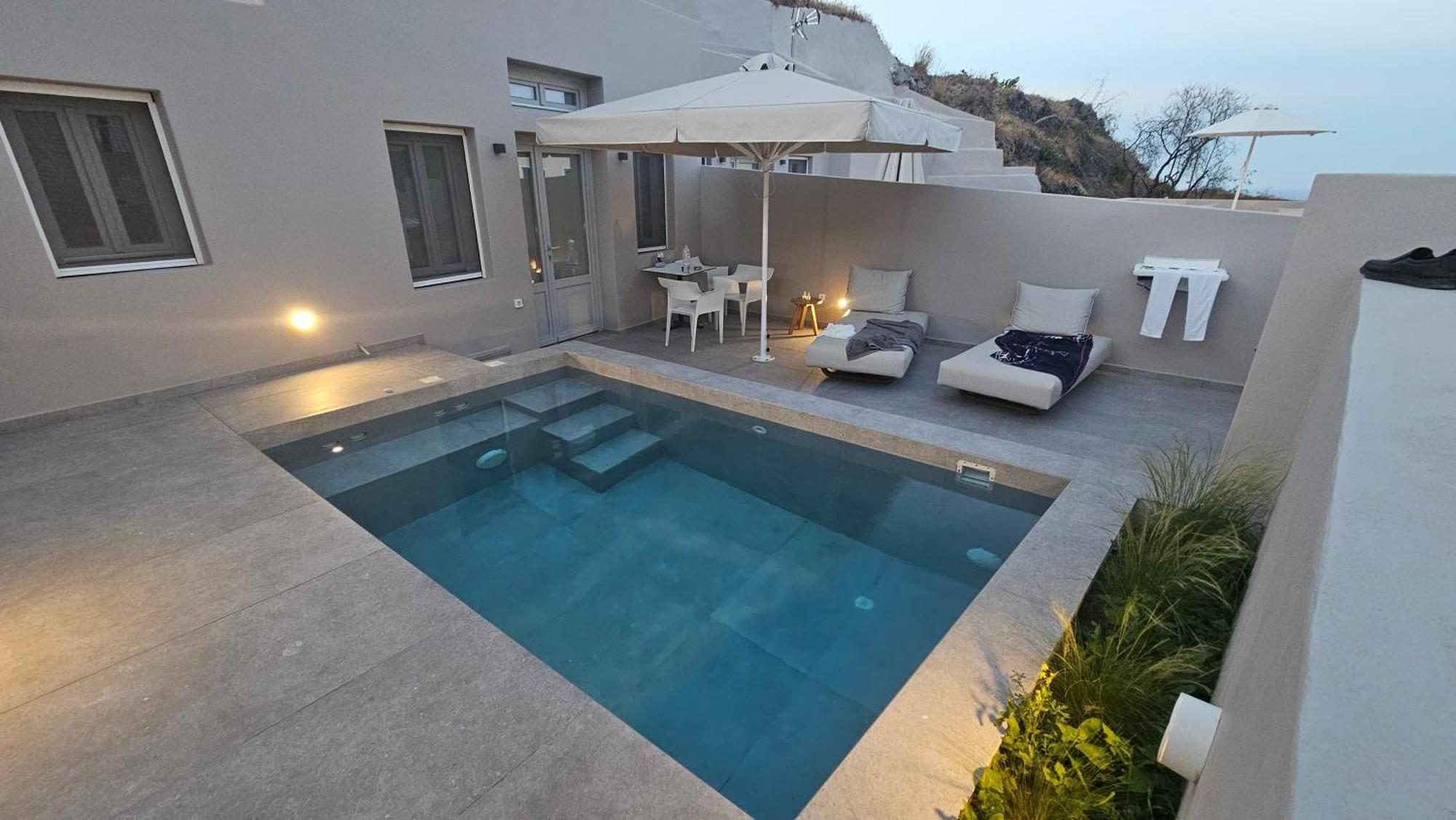 Petroma Cave Suites Vourvoulos Номер фото