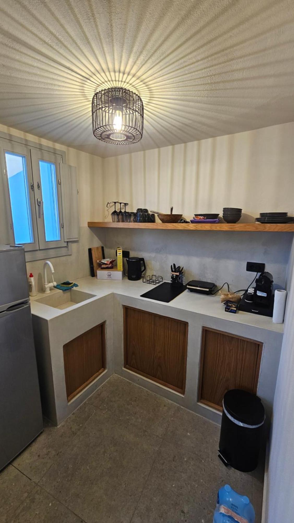Petroma Cave Suites Vourvoulos Номер фото
